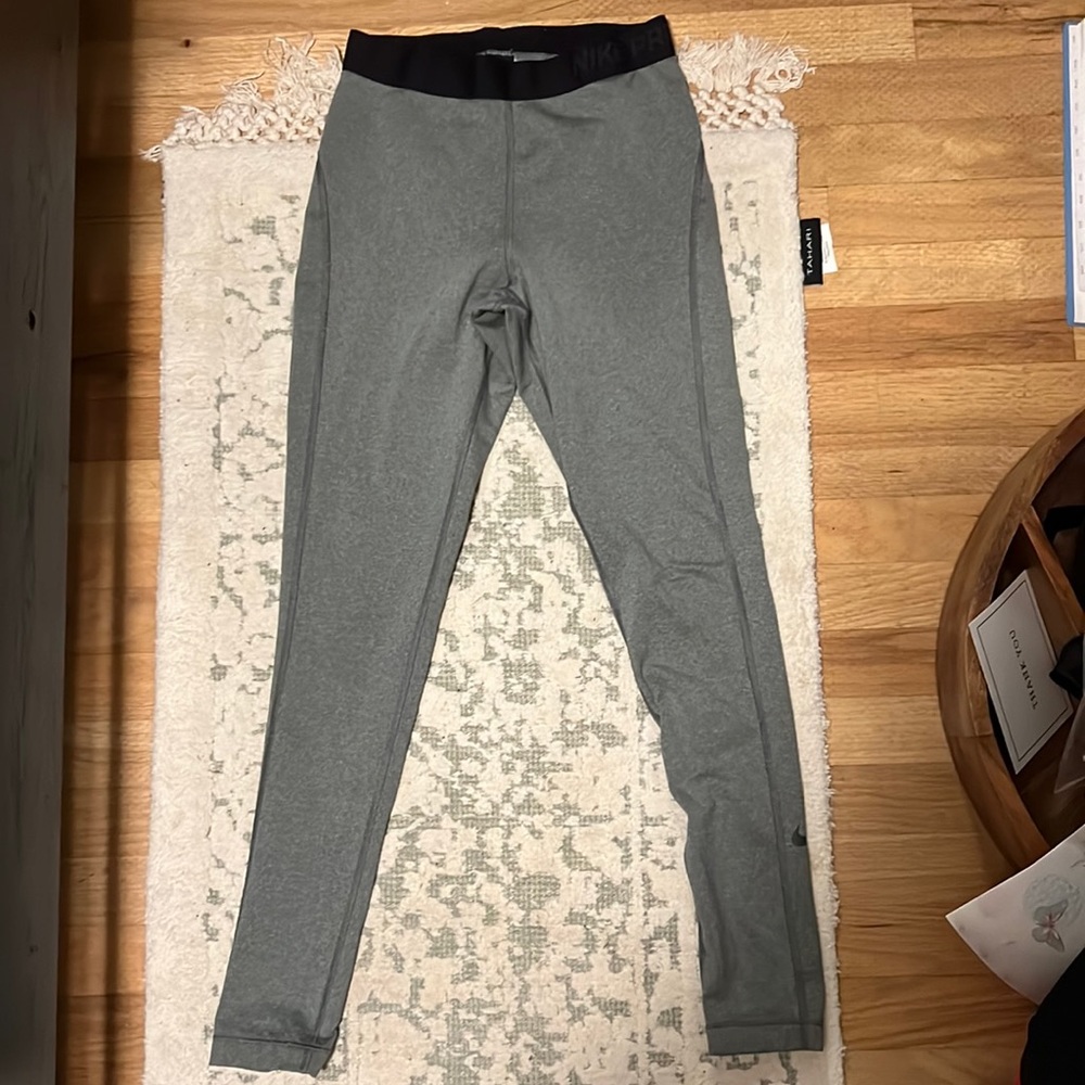 Lightly worn Nike pro gray leggings with black waistband